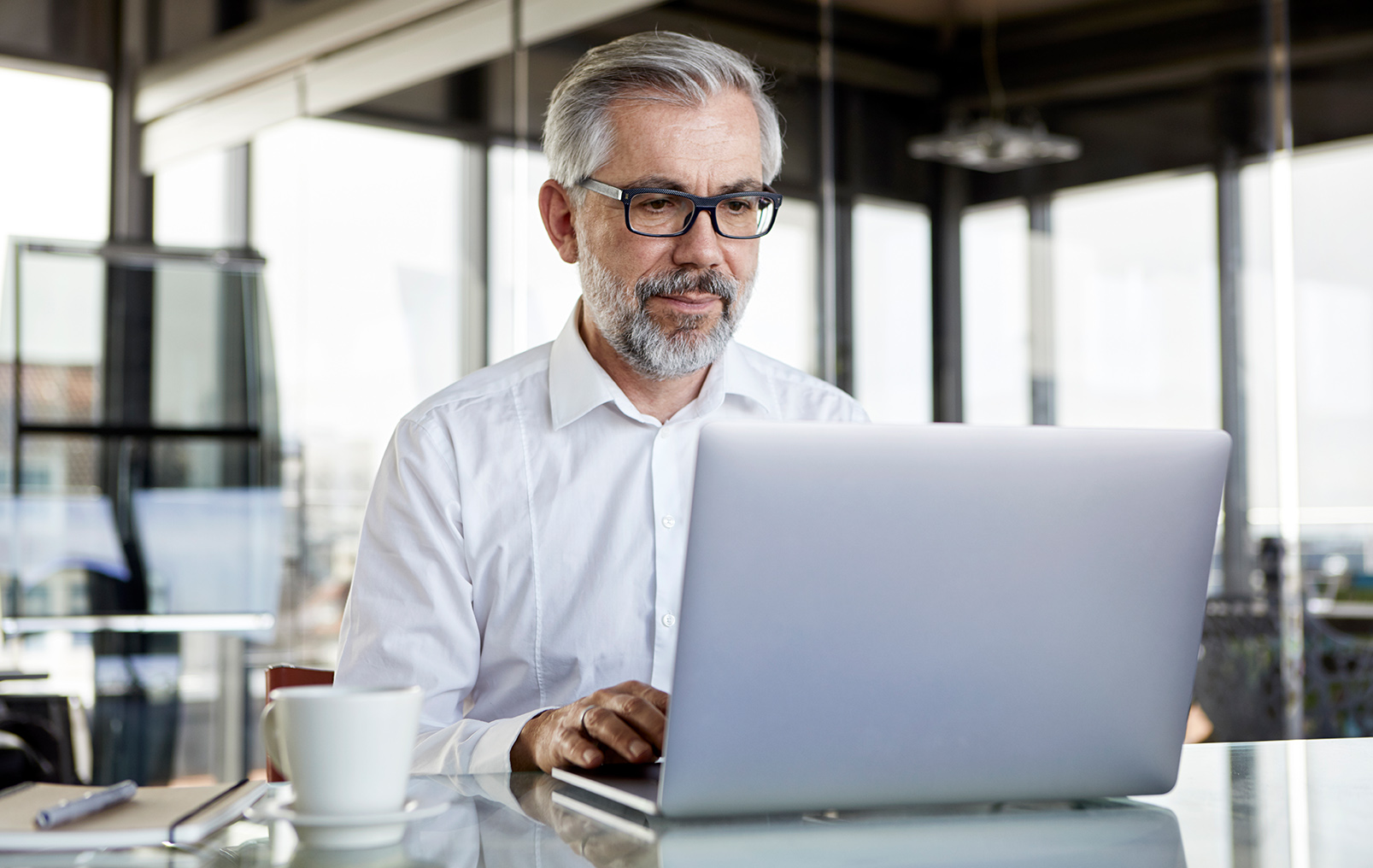 Older man at laptop