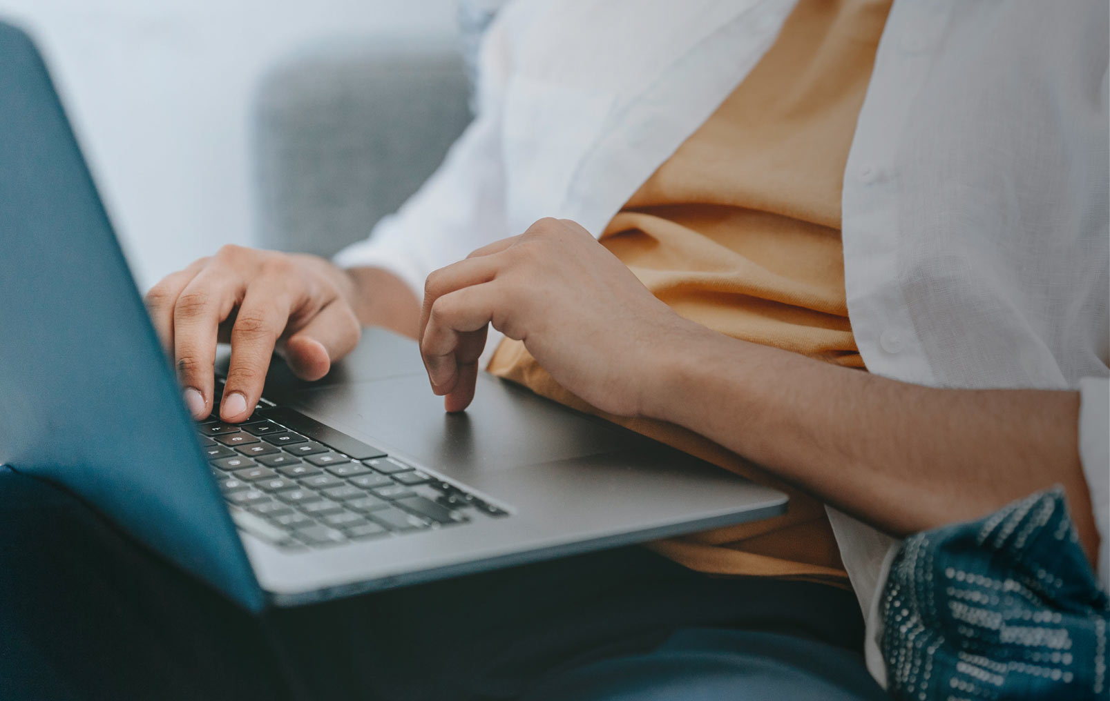 woman typing on laptop 