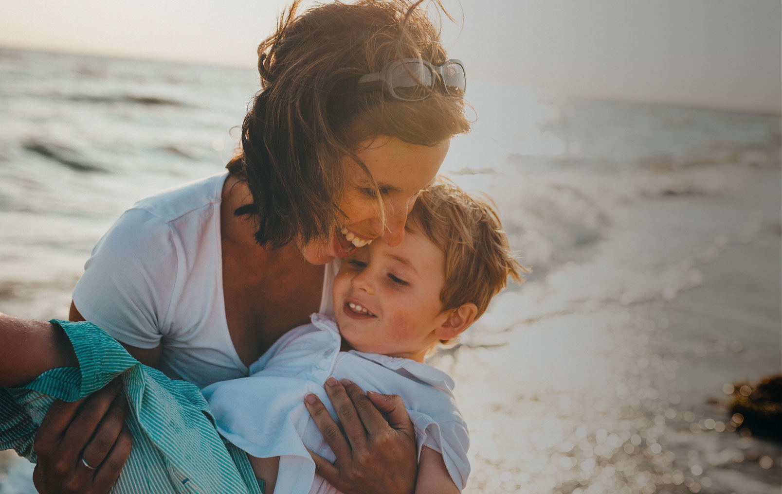 Woman and child at the beach