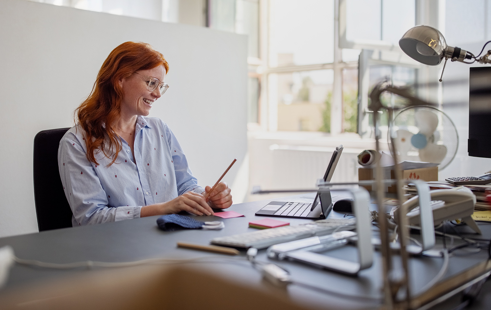 Woman chatting at laptop